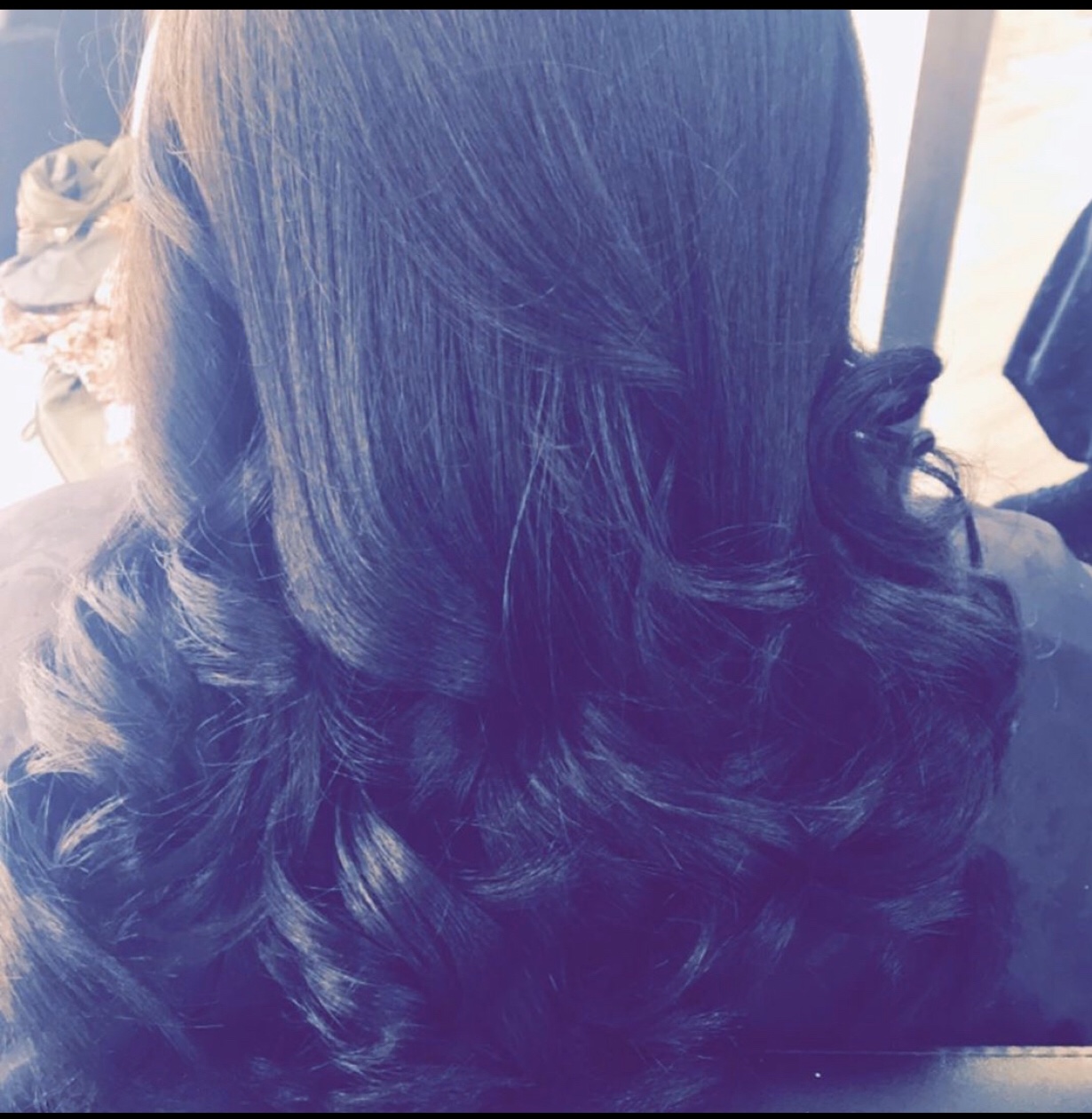 Deep, bouncy curls on dark hair